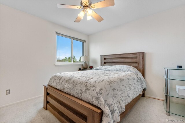 20835 E 47th Ave, Denver, CO 80249 - bedroom with baseboards, a ceiling fan, and light colored carpet
