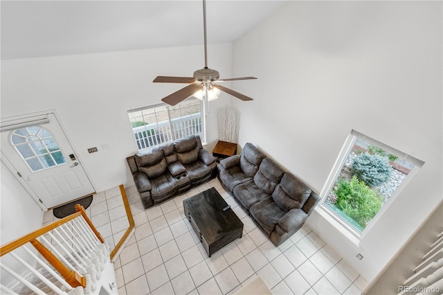 20835 E 47th Ave, Denver, CO 80249 - living room with light tile patterned floors, ceiling fan, and high vaulted ceiling