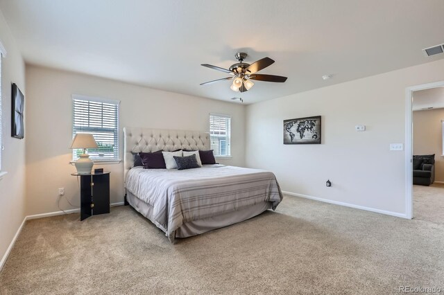 12578 Hudson Ct, Thornton, CO 80241 - bedroom featuring light colored carpet, baseboards, and ceiling fan