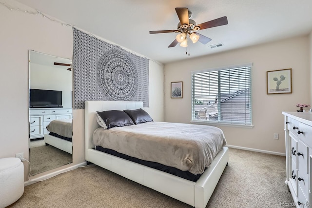 12578 Hudson Ct, Thornton, CO 80241 - bedroom with light colored carpet, baseboards, and a ceiling fan