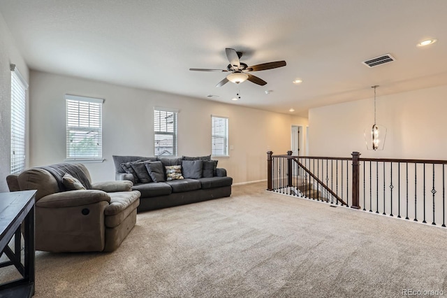 12578 Hudson Ct, Thornton, CO 80241 - carpeted living area with a ceiling fan and recessed lighting