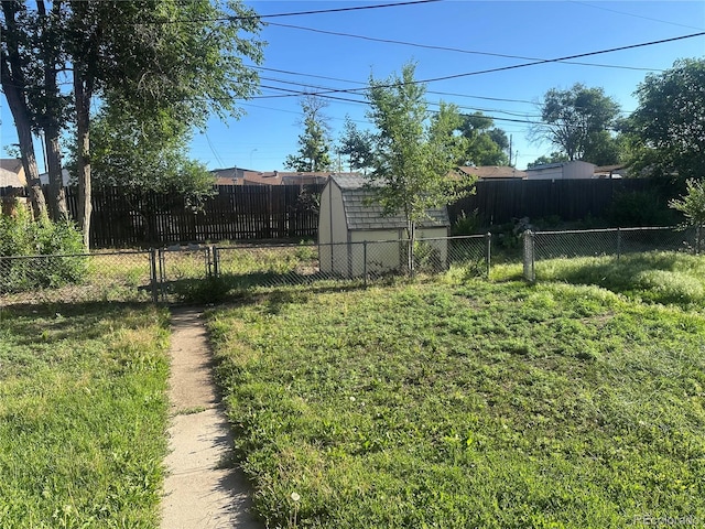 6671 E 73rd Pl, Commerce City, CO 80022 - fenced backyard with a shed