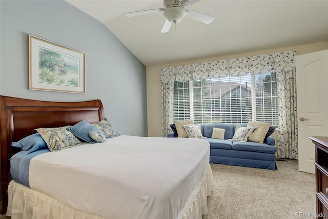bedroom featuring light carpet, ceiling fan, and lofted ceiling