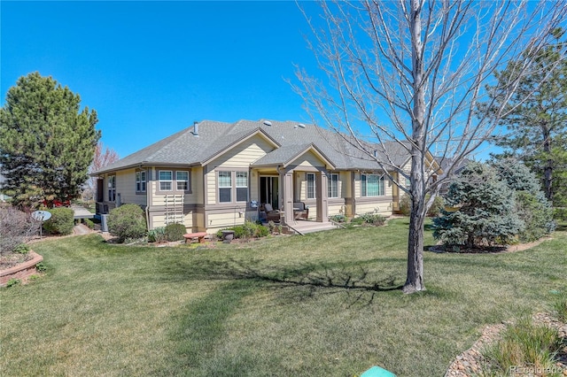 ranch-style home with a front yard