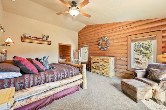 carpeted bedroom featuring lofted ceiling, rustic walls, and ceiling fan