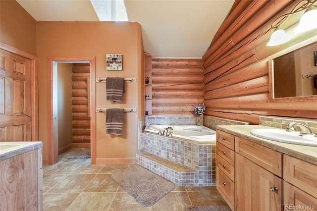 full bath featuring rustic walls, a garden tub, baseboards, and vanity