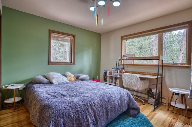 bedroom featuring hardwood / wood-style flooring