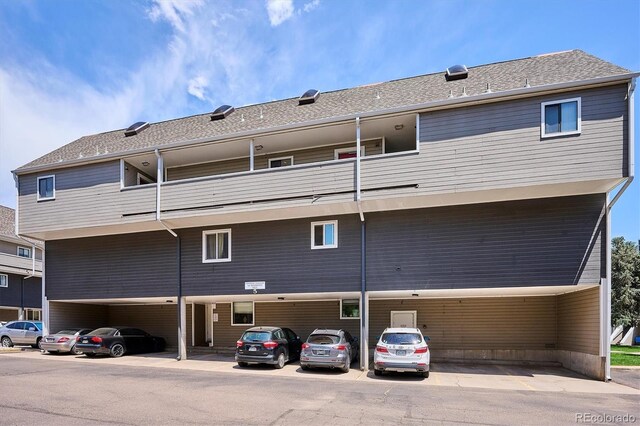 5250 S Huron Way Unit 5-308, Littleton, CO 80120 - rear view of property with covered parking