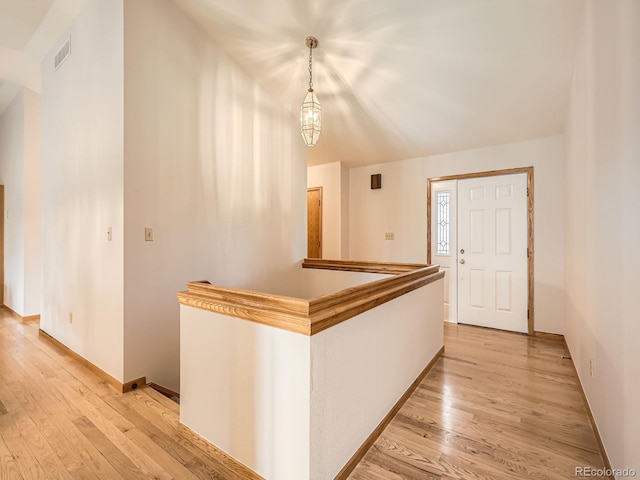 9670 W 69th Ave, Arvada, CO 80004 - corridor featuring light wood-type flooring and baseboards