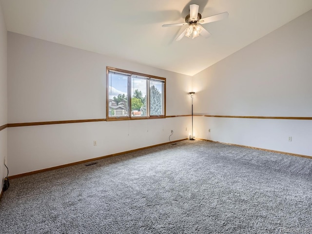 9670 W 69th Ave, Arvada, CO 80004 - carpeted empty room with ceiling fan, vaulted ceiling, and baseboards