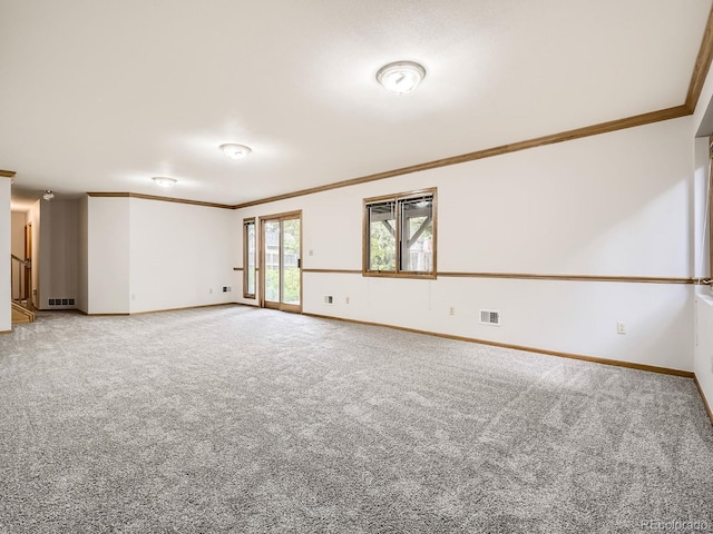 9670 W 69th Ave, Arvada, CO 80004 - empty room with ornamental molding, light colored carpet, and baseboards