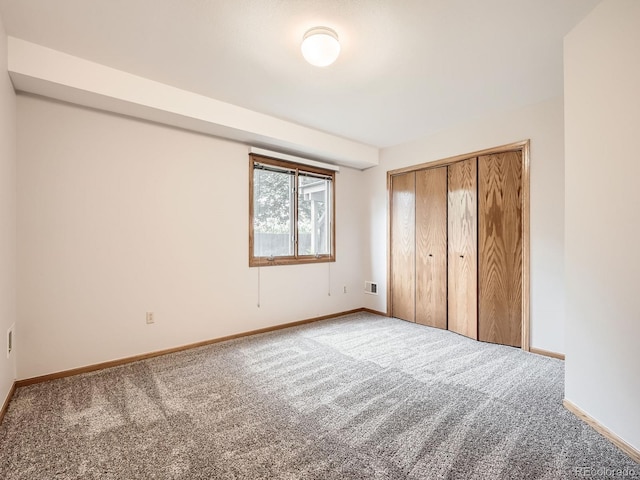 9670 W 69th Ave, Arvada, CO 80004 - unfurnished bedroom with carpet floors, baseboards, and a closet