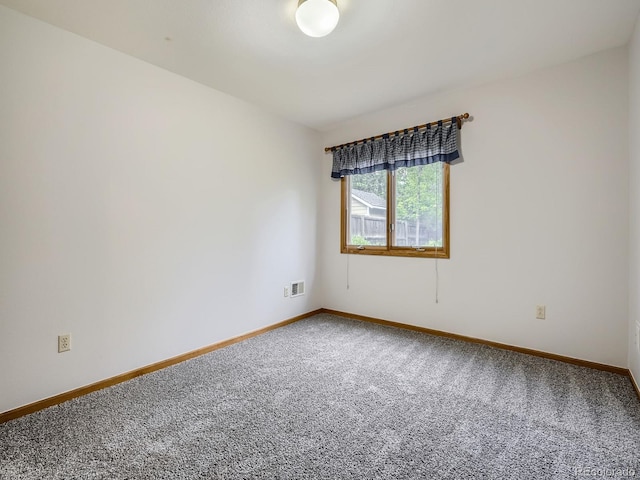 9670 W 69th Ave, Arvada, CO 80004 - empty room with carpet and baseboards