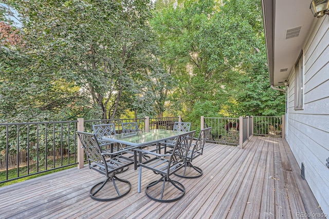 9670 W 69th Ave, Arvada, CO 80004 - wooden deck with outdoor dining area