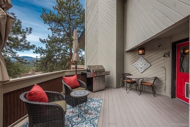 1854 Foothills Dr S, Golden, CO 80401 - wooden deck featuring a mountain view and area for grilling
