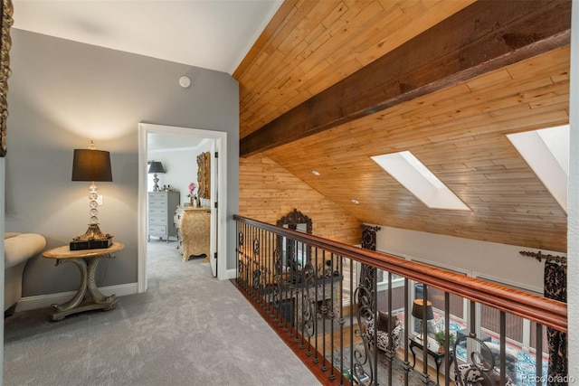 1854 Foothills Dr S, Golden, CO 80401 - hallway featuring baseboards, wooden ceiling, carpet flooring, and lofted ceiling with skylight