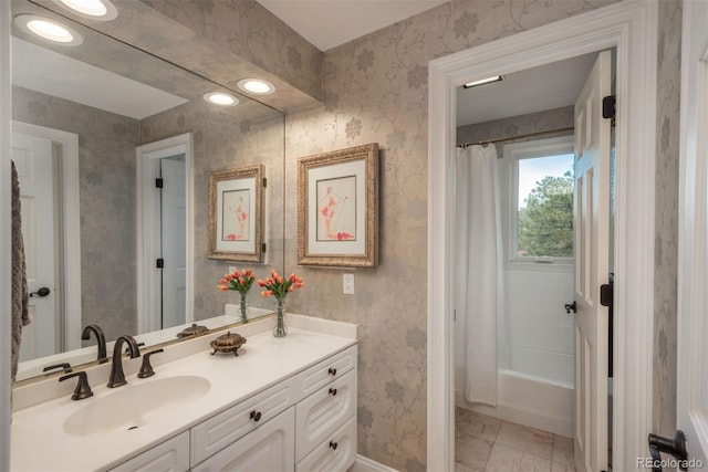 1854 Foothills Dr S, Golden, CO 80401 - full bath featuring vanity, baseboards, and wallpapered walls