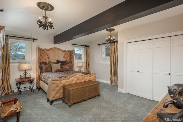 1854 Foothills Dr S, Golden, CO 80401 - carpeted bedroom featuring a closet, beamed ceiling, a notable chandelier, and baseboards