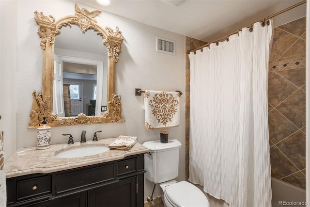 1854 Foothills Dr S, Golden, CO 80401 - full bathroom featuring toilet, vanity, a textured wall, and visible vents