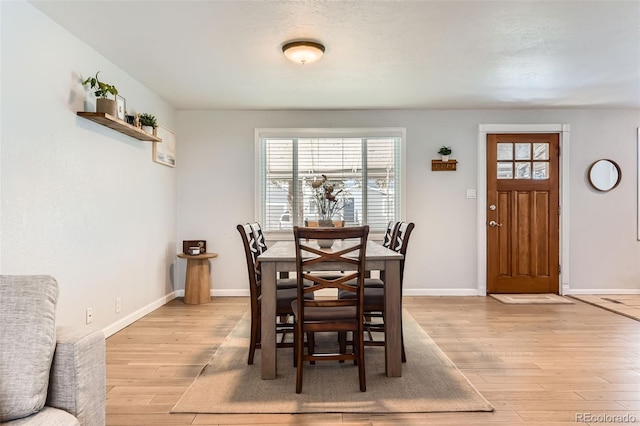 dining room featuring light wood-type flooring