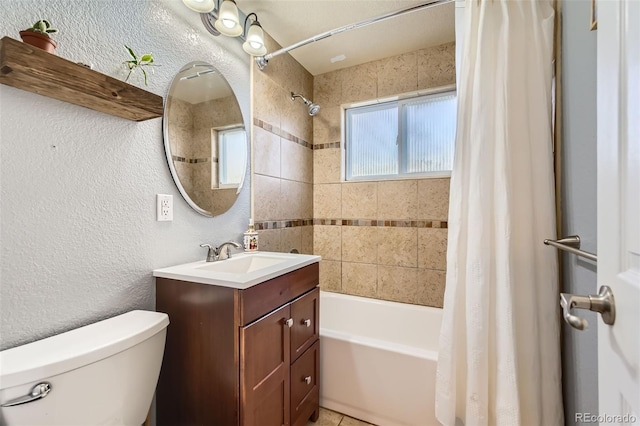 full bathroom featuring vanity, shower / bath combination with curtain, and toilet