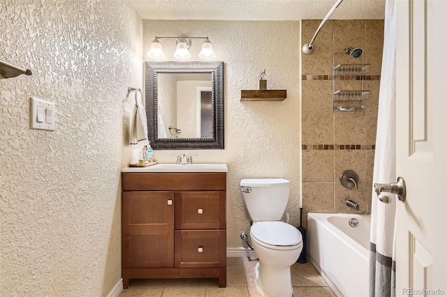 full bathroom with toilet, a textured ceiling, vanity, tiled shower / bath combo, and tile patterned flooring