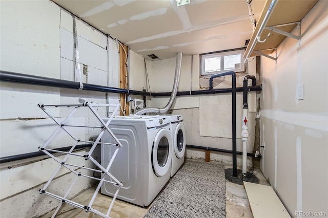 laundry area featuring washer and clothes dryer