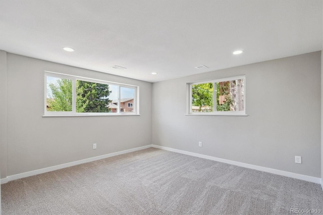 13051 W Jewell Cir, Lakewood, CO 80228 - carpeted empty room featuring healthy amount of natural light and recessed lighting