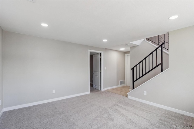 13051 W Jewell Cir, Lakewood, CO 80228 - carpeted spare room featuring stairway and recessed lighting