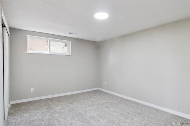 13051 W Jewell Cir, Lakewood, CO 80228 - carpeted spare room featuring baseboards