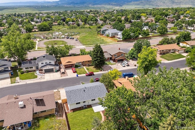 13051 W Jewell Cir, Lakewood, CO 80228 - aerial perspective of suburban area with a mountainous background