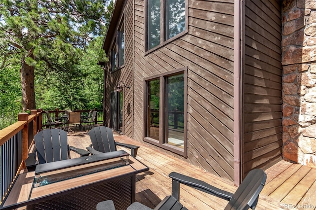 20223 Goins Dr, Morrison, CO 80465 - deck featuring outdoor dining area
