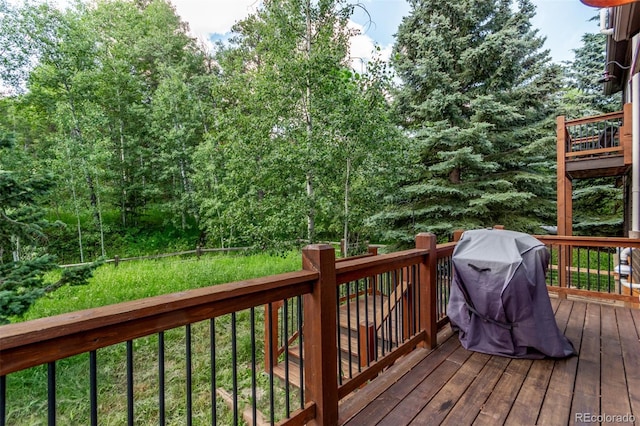 20223 Goins Dr, Morrison, CO 80465 - wooden deck featuring area for grilling