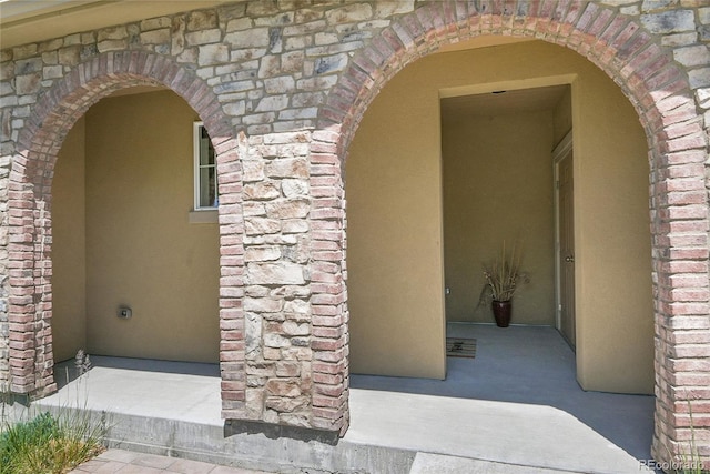 3437 Rosato Dr Unit C, Highlands Ranch, CO 80126 - property entrance featuring stone siding and stucco siding