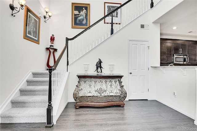 3437 Rosato Dr Unit C, Highlands Ranch, CO 80126 - stairs with wood finished floors, baseboards, and recessed lighting