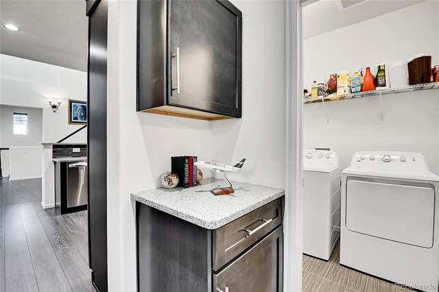 3437 Rosato Dr Unit C, Highlands Ranch, CO 80126 - washroom featuring washer and clothes dryer, recessed lighting, and light wood-style floors