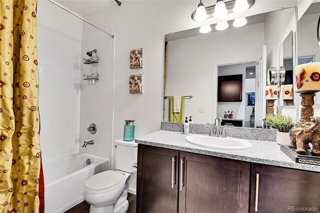 3437 Rosato Dr Unit C, Highlands Ranch, CO 80126 - bathroom with shower / tub combo, toilet, vanity, and wood finished floors