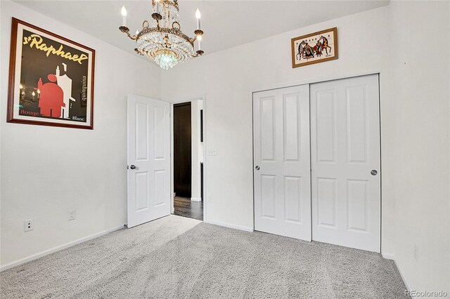 3437 Rosato Dr Unit C, Highlands Ranch, CO 80126 - unfurnished bedroom featuring carpet, a chandelier, baseboards, and a closet