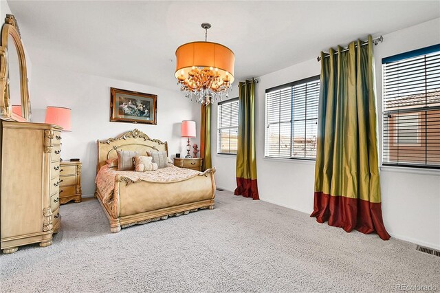 3437 Rosato Dr Unit C, Highlands Ranch, CO 80126 - bedroom featuring carpet flooring, a chandelier, and baseboards