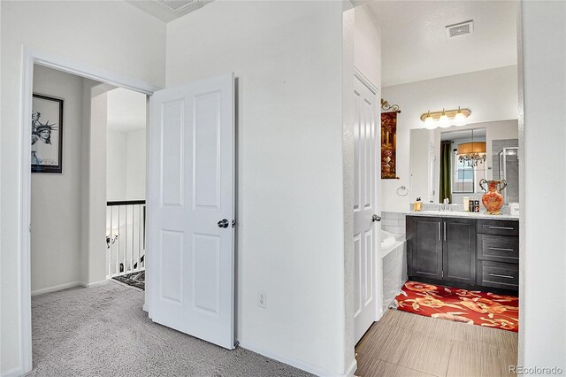 3437 Rosato Dr Unit C, Highlands Ranch, CO 80126 - full bathroom with vanity, a bath, and baseboards