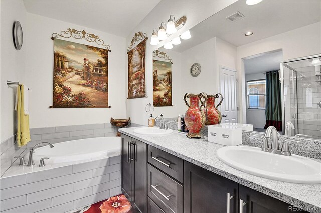 3437 Rosato Dr Unit C, Highlands Ranch, CO 80126 - full bathroom with double vanity, a garden tub, and a stall shower