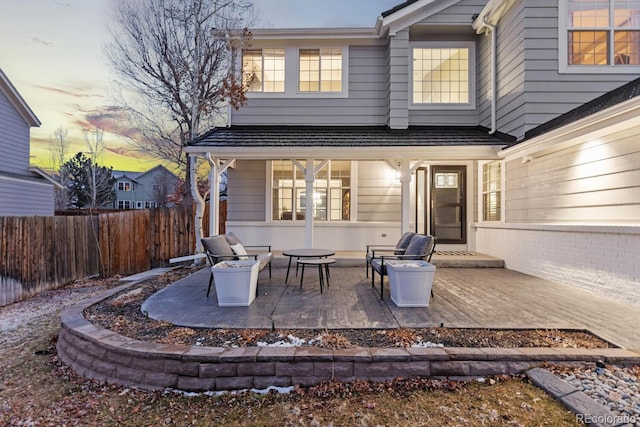 patio terrace at dusk with fence