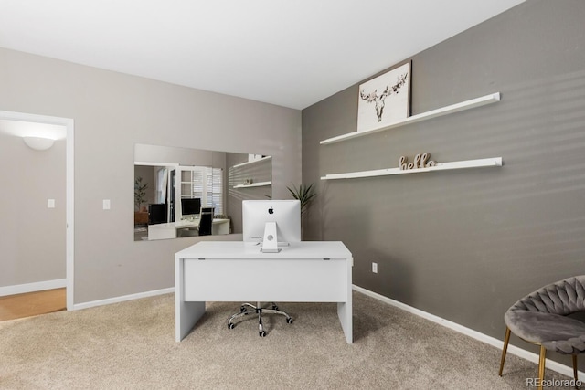 carpeted office with baseboards