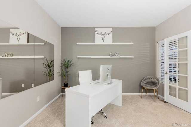 office area with baseboards and carpet floors