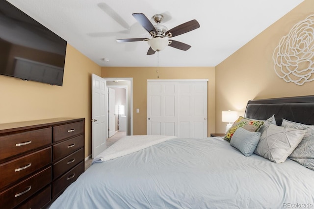 bedroom featuring a closet and ceiling fan