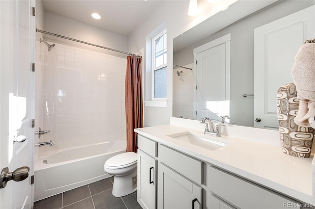 full bathroom with vanity, shower / bath combination with curtain, toilet, and tile patterned floors