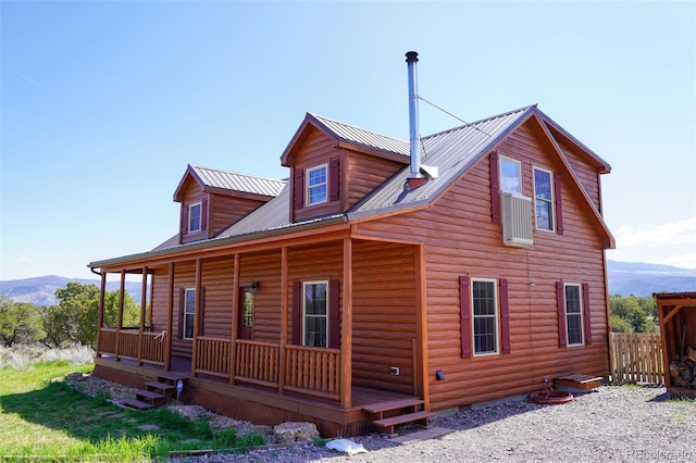 view of side of property featuring a mountain view