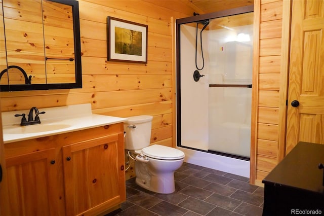 bathroom with tile flooring, wooden walls, vanity, and toilet