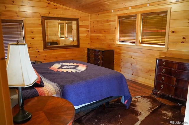 bedroom featuring wooden ceiling, wood-type flooring, and vaulted ceiling