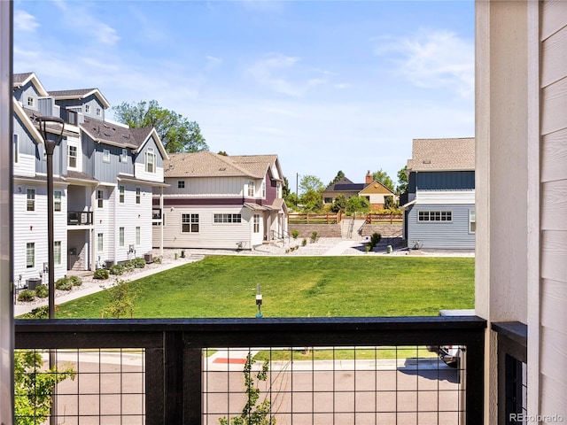 6162 W 28th Ct, Edgewater, CO 80214 - view of grassy yard featuring a balcony and a residential view